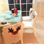 Vánoční návleky na židle s motivem roztomilého soba